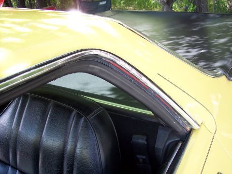 1972 Ford Ranchero - Interior view of a car, focusing on the seat and the upper body trim.
