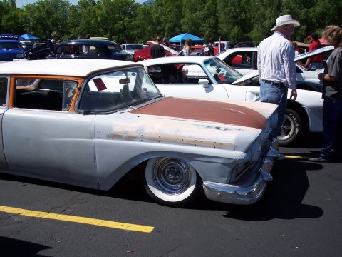 1972 Ford Ranchero - Customized 1957 Ford Fairlane 500 Skyliner at a car show, showing its unique retractable hardtop mechanism.