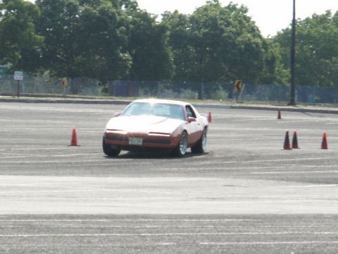 2001 Mercury Grand Marquis - Sports coupe in a driving event with orange cones marking the course.