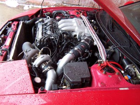 1995 Ford Probe - Engine bay modifications visible, including a turbocharger and custom piping.