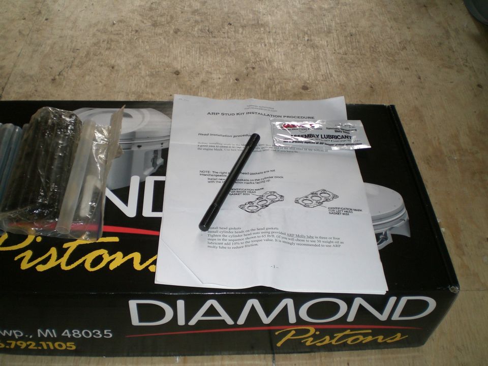 ARP studs and installation instructions on a Diamond Pistons box