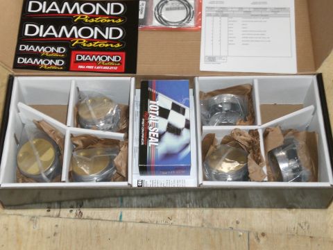 1995 Ford Probe - Box of Diamond Pistons and Total Seal piston rings, includes documentation and stickers.