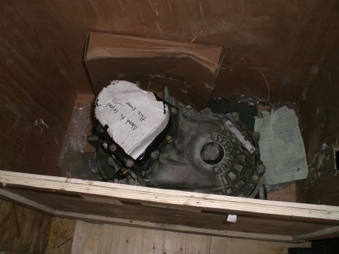 1995 Ford Probe - Transmission part in a wooden crate, with a handwritten note attached.