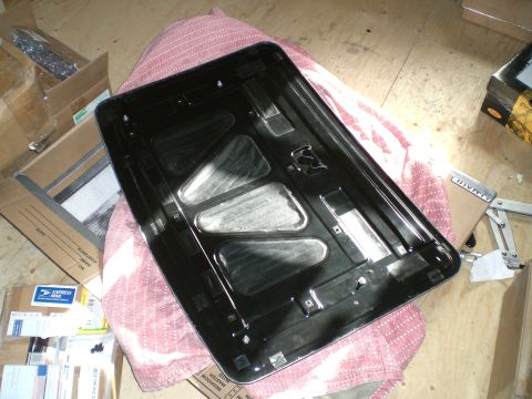 1995 Ford Probe - The underside of a car hood is shown, with various mounting points and structural reinforcements visible.