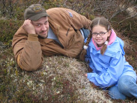 2000 Ford E350 - Man and girl posing for a photo outdoors in a grassy, rocky area.