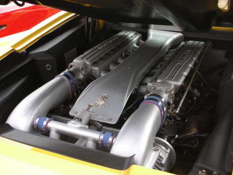 1998 Ford Crown Victoria - Close-up of a Lamborghini V10 engine, showing the intake manifold and "5.7L" designation.