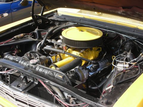 1998 Ford Crown Victoria - Close-up of a modified engine bay, a prominent supercharger and air intake system.