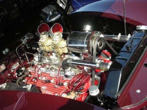 1998 Ford Crown Victoria - Close-up of a modified engine bay, dual carburetors and custom components.