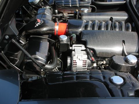 1998 Ford Crown Victoria - Custom engine bay features carbon fiber components and an aftermarket intake system.
