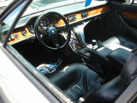 1998 Ford Crown Victoria - Interior view of a classic car, showing the dashboard, seats, and gear shifter.