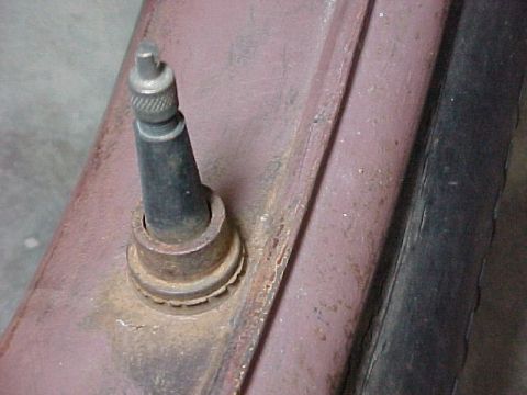 1913 Ford Model T - Firestone 30 X 31/2 rim showing the heavy locating lug that provides protection for the valve stem and makes it impossible for the rim to m…