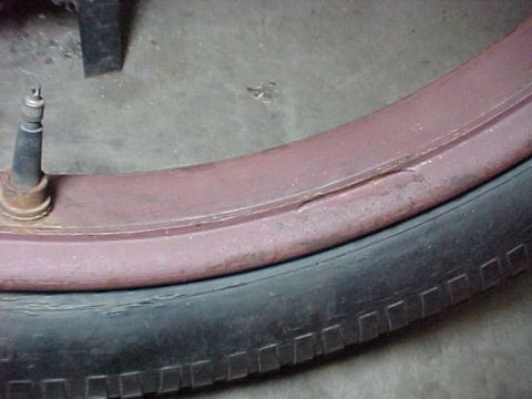 1913 Ford Model T - Firestone rim showing machined groove for the mounting lug and tapered rim inner circumference.