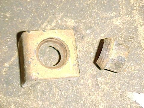 1913 Ford Model T - Firestone locking lug and nut showing the beveled nut and countersunk lug.