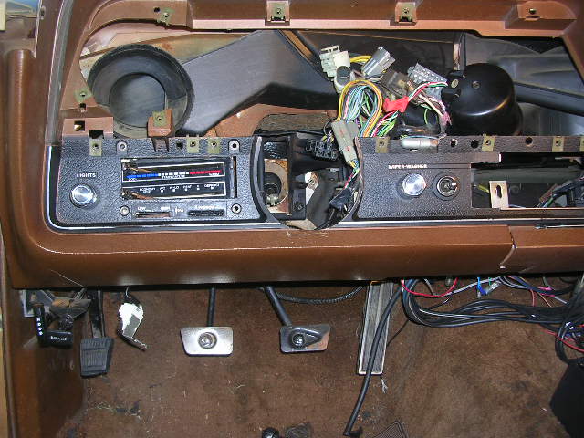 Interior dashboard with radio and exposed wiring