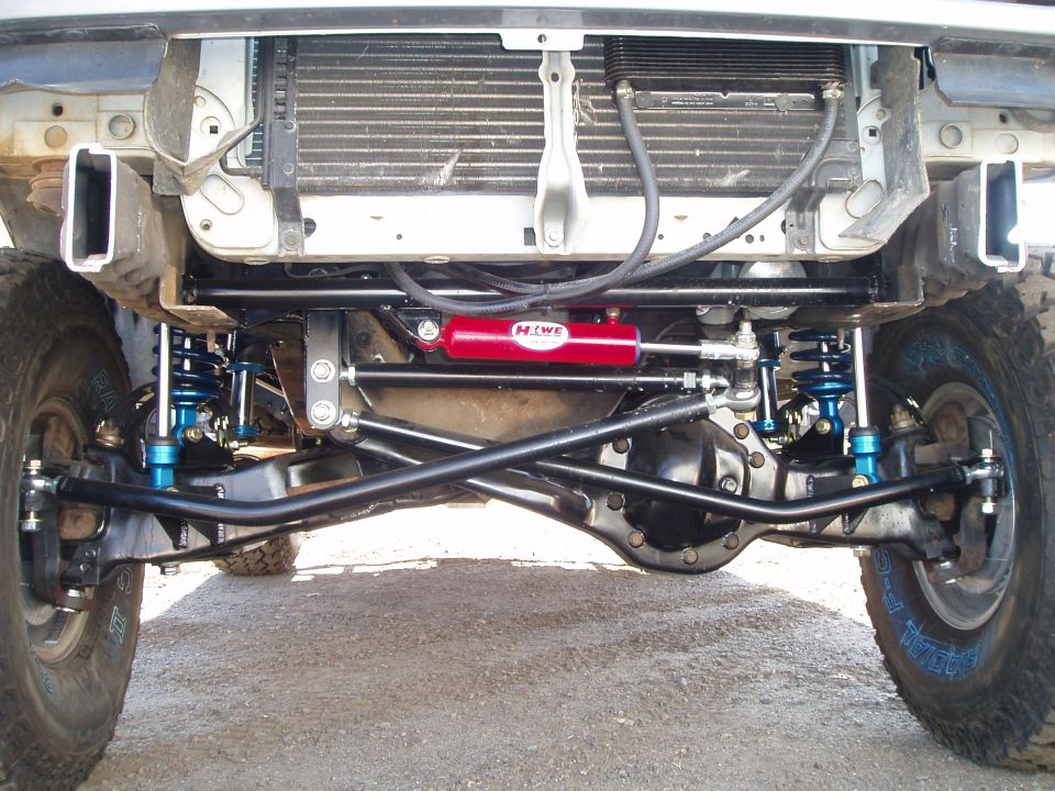 Front suspension and steering of a lifted truck from below