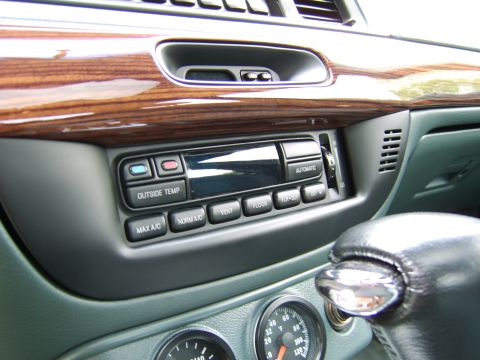 1996 Mercury Grand Marquis - Interior view of a 1996 Mercury Grand Marquis, showing the dashboard with climate controls and auxiliary gauges.