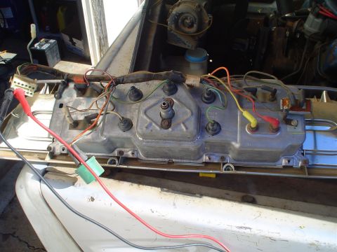 1967 Ford F-250 - Instrument cluster wiring is exposed and connected to test leads.