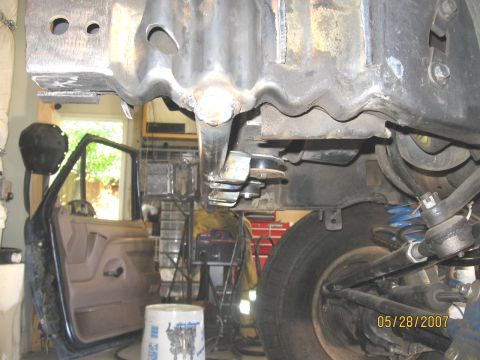 1994 Ford Bronco - Close-up view of the reworked core support and suspension system on a 1994 Ford Bronco.