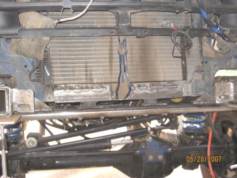 1994 Ford Bronco - This photo shows the radiator and suspension system of a vehicle, likely during some form of modification or repair.