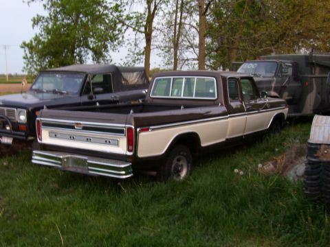 1979 Ford F-150 - Rear view of a two-tone brown and cream Ford F-150 pickup truck parked outdoors.