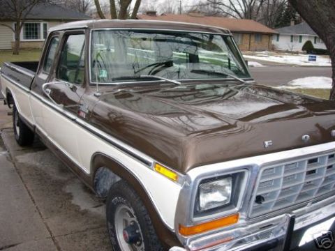 1979 Ford F-150 - This 1979 Ford F-150 pickup truck features a brown and white paint scheme.