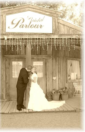 1991 Ford Bronco - A bride and groom share a moment outside the Bridal Parlour.
