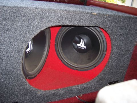 1991 Ford Bronco - A close-up view of a dual subwoofer enclosure with JL Audio speakers.