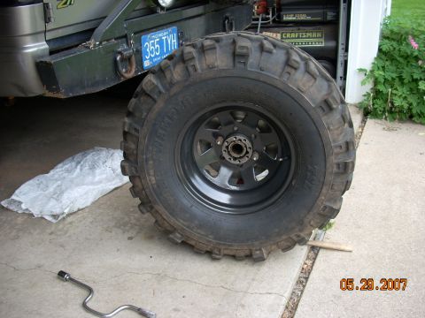 2000 Chevrolet Tahoe - Close-up of a large off-road tire and wheel on a vehicle.
