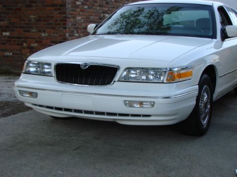 1997 Mercury Grand Marquis - I thought the grille would looked better blacked out. So to see if I liked it, I used electrical tape to try it...