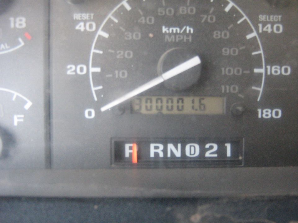 Dashboard gauges showing 30000 miles and PRND21 gear selection
