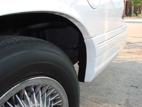 1997 Mercury Grand Marquis - I blacked out the wide section of the bumper cover that shows in the wheel well. It looked too wide before.