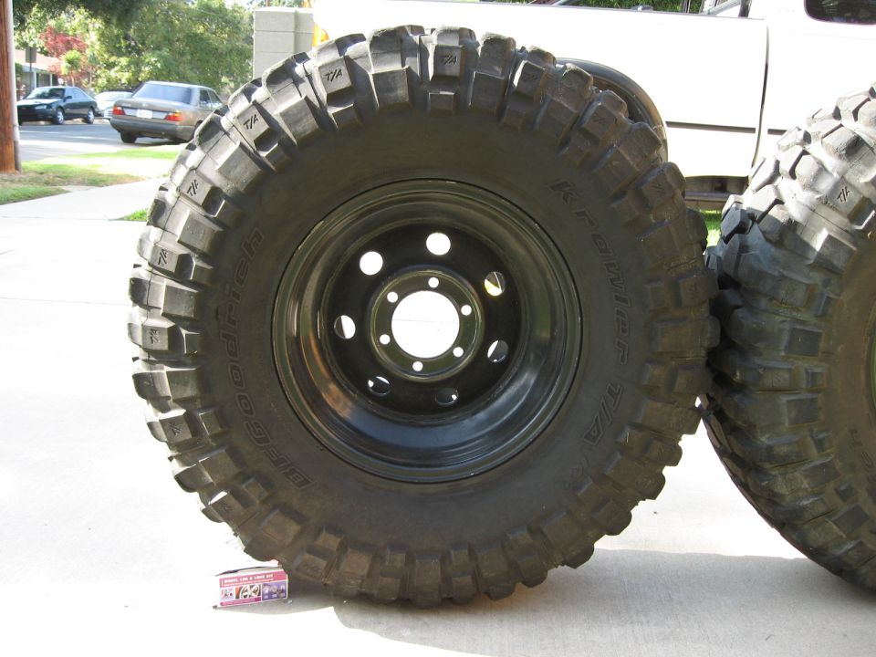 BFGoodrich Krawler T/A tire on black steel wheel standing on a driveway