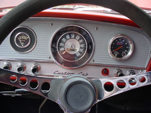1965 Ford F-100 interior dashboard with speedometer and gauges