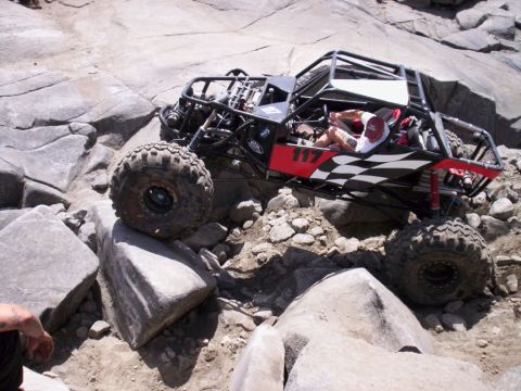 1989 Ford Bronco - A custom-built off-road buggy tackles a challenging rocky obstacle course.