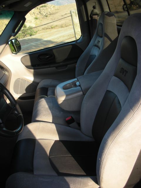 1998 Ford Crown Victoria - Interior view of a truck showing SVT seats and center console.