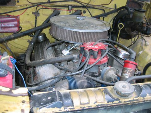 1992 Ford Mustang - Close-up of a V8 engine bay, aftermarket MSD ignition parts and a prominent air filter.