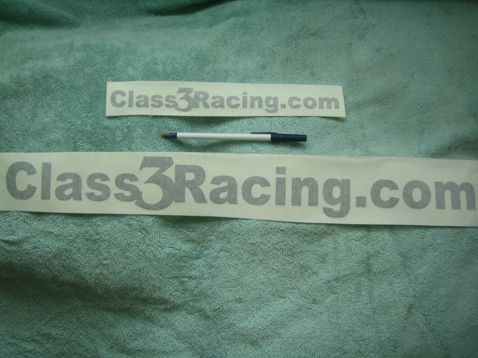 Two 'Class3Racing.com' vinyl decals with pen on green fabric