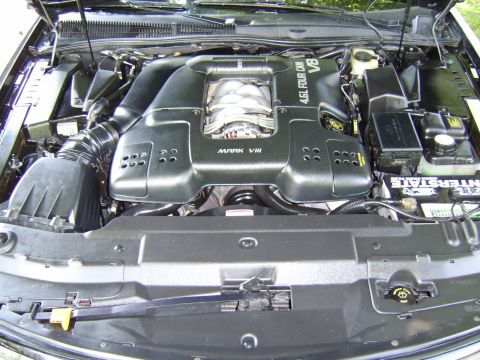1996 Mercury Grand Marquis - The engine bay shows a "MARK VIII" inscription, indicating it is not a 1996 Mercury Grand Marquis.