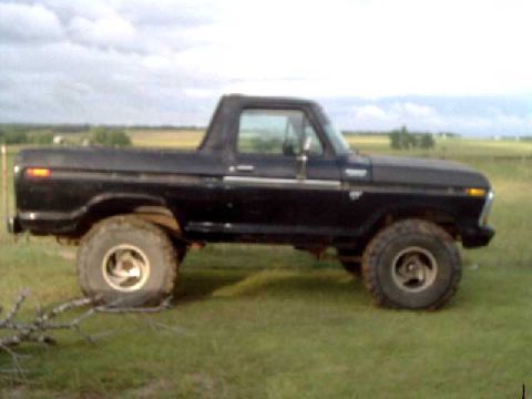 1978 Ford Bronco - This 1978 Ford Bronco is shown in a side profile, a lifted suspension and oversized tires.