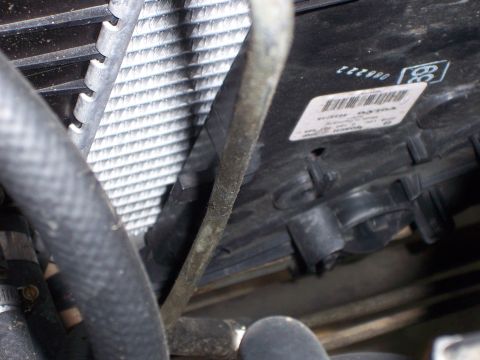 1991 Ford Bronco - The bottom of the fan slides right into the remaining room left on the radiator support. It's just wide enough to cover a majority of the r…