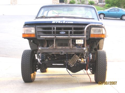 1994 Ford Bronco - Front view of a 1994 Ford Bronco, modified with a custom bumper and WT4x4.com decal on the hood.