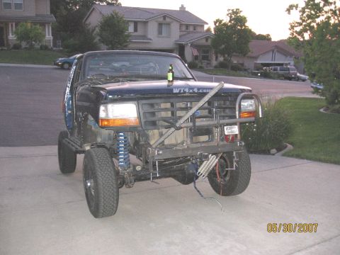 1994 Ford Bronco - This modified pickup truck has a custom front end and a beer bottle on the hood, photographed on May 30, 2007.