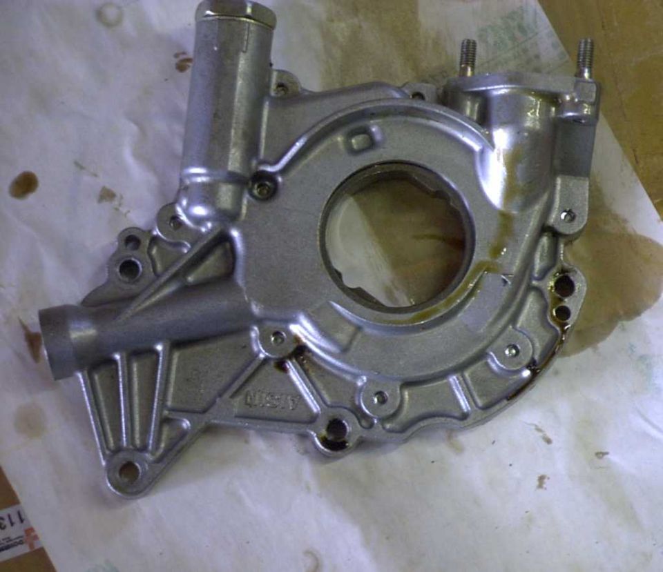 Silver oil pump with "40893" cast into it