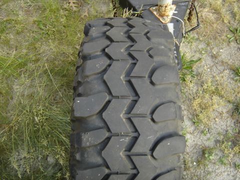 1988 Ford Bronco - This image shows a single off-road tire, not a 1988 Ford Bronco.