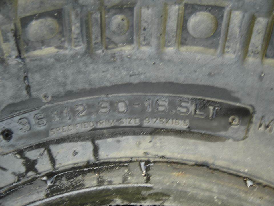 Tire sidewall stamped 36x12.50-16.5LT with specified rim size 9.75x16.5