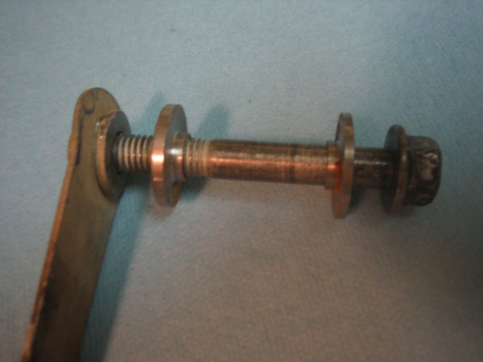 Bolt with washers and bracket