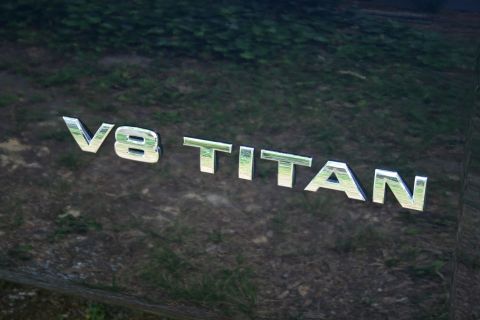 2007 Nissan Titan - Close-up of the V8 TITAN badging on the side of a truck.