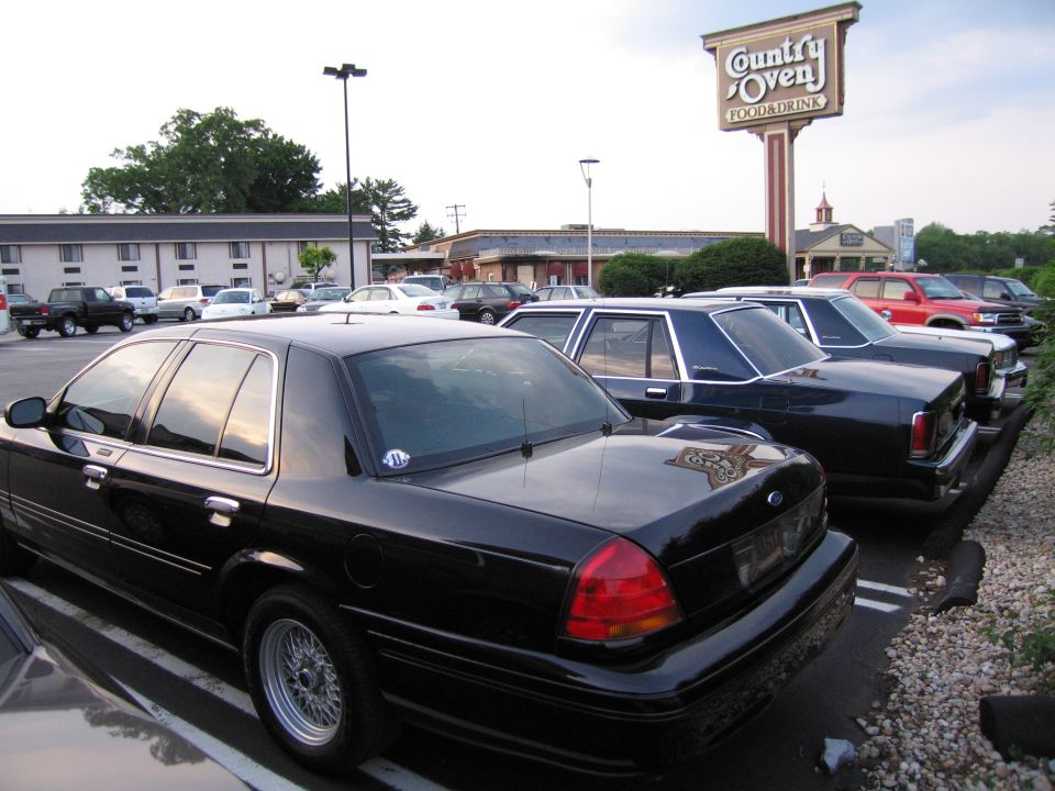 Black 1991 Ford Crown Victoria LTD rear view parked in lot