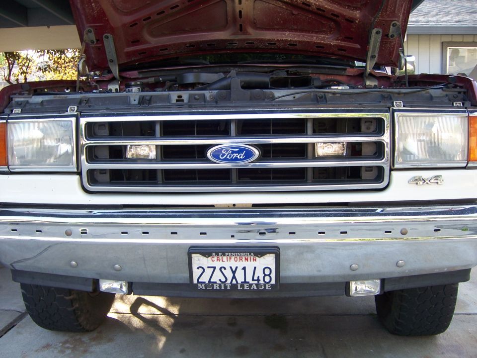 Added some lights behind the grill and under the bumper and tied them into the toggle witch panel in the cab.