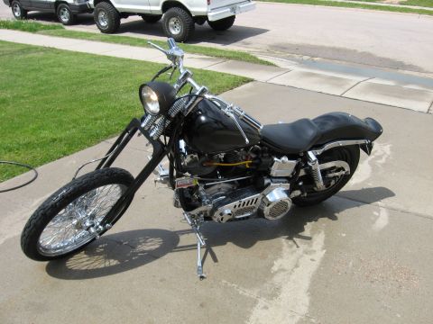 1979 Harley-Davidson FXRT Sport Glide - redid bike again in 07. painted black, dna springer and 21" front wheel. Ultima caliper and discs. new 1 piece tank, rear fender, struts, a…